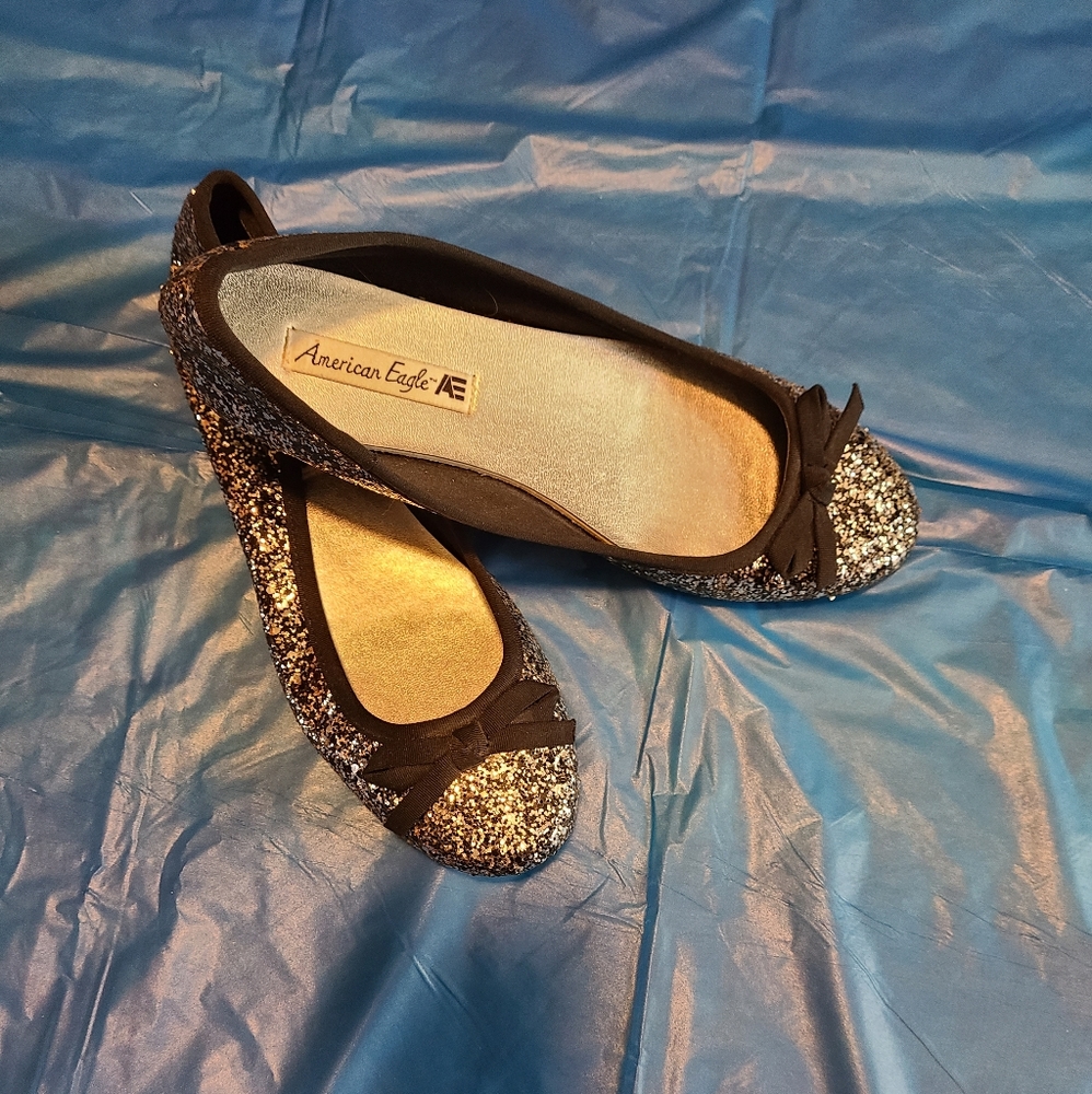 Black and silver sparkly flat heeled dress shoes
